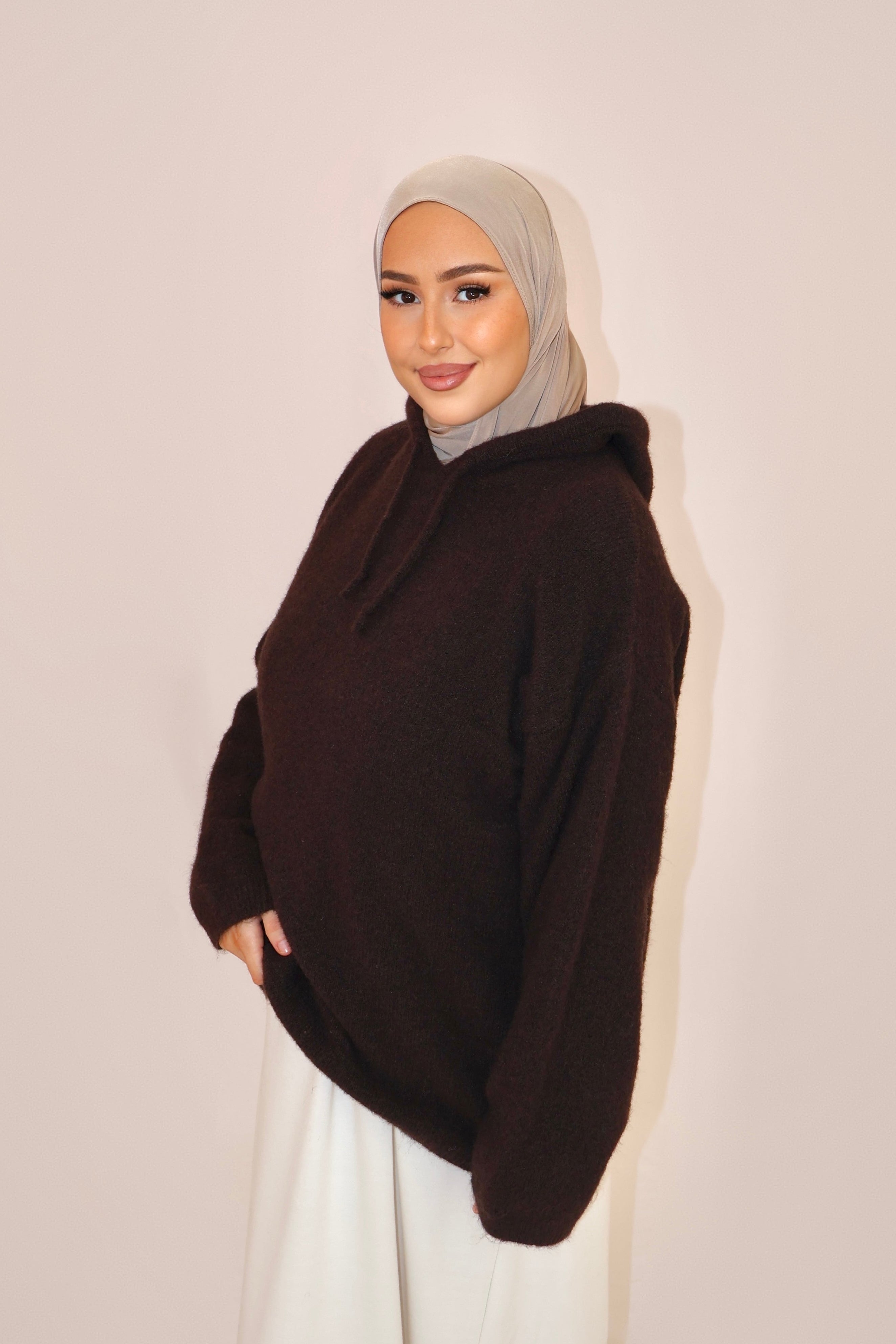 Pull en maille à capuche