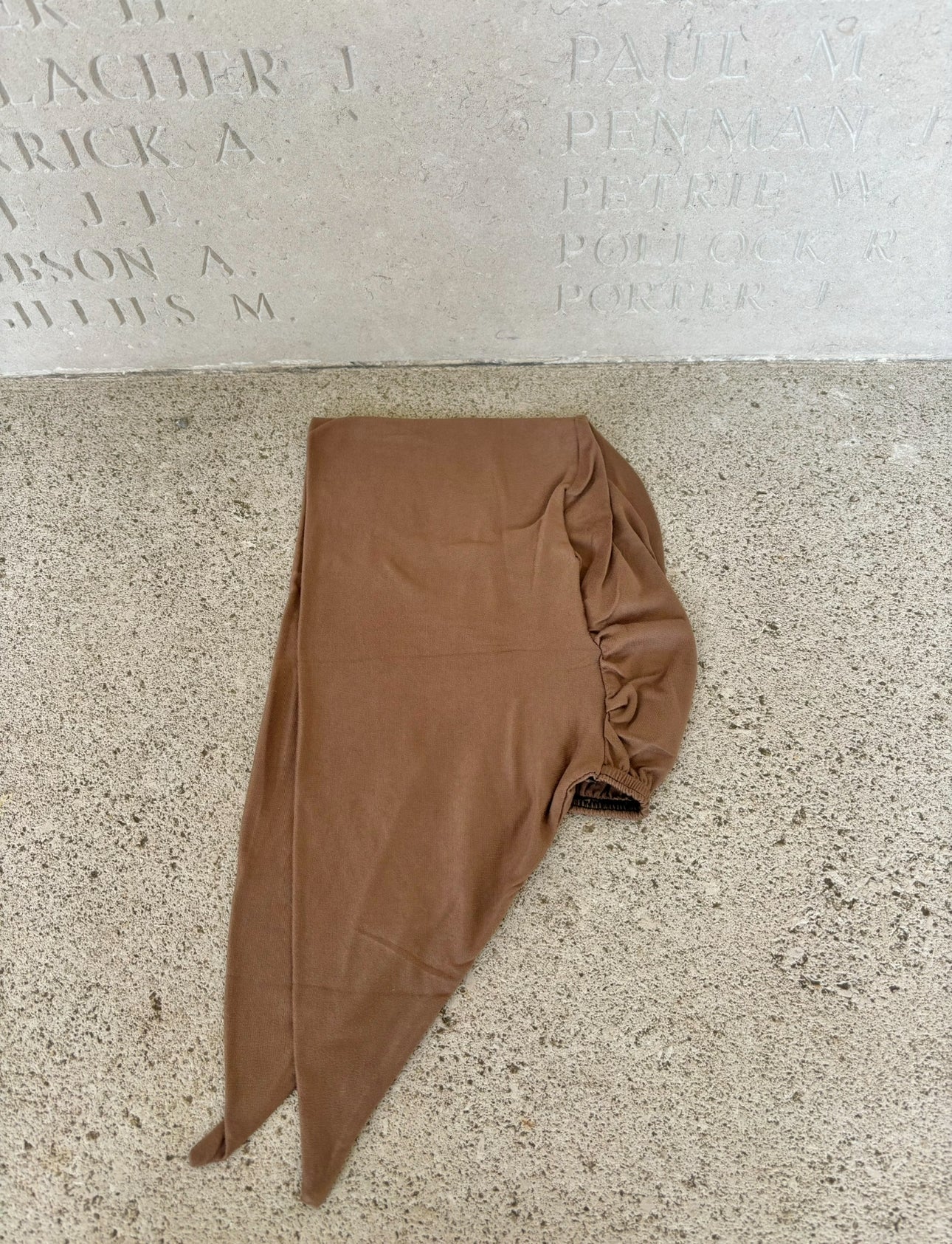 Light brown tie-up hat